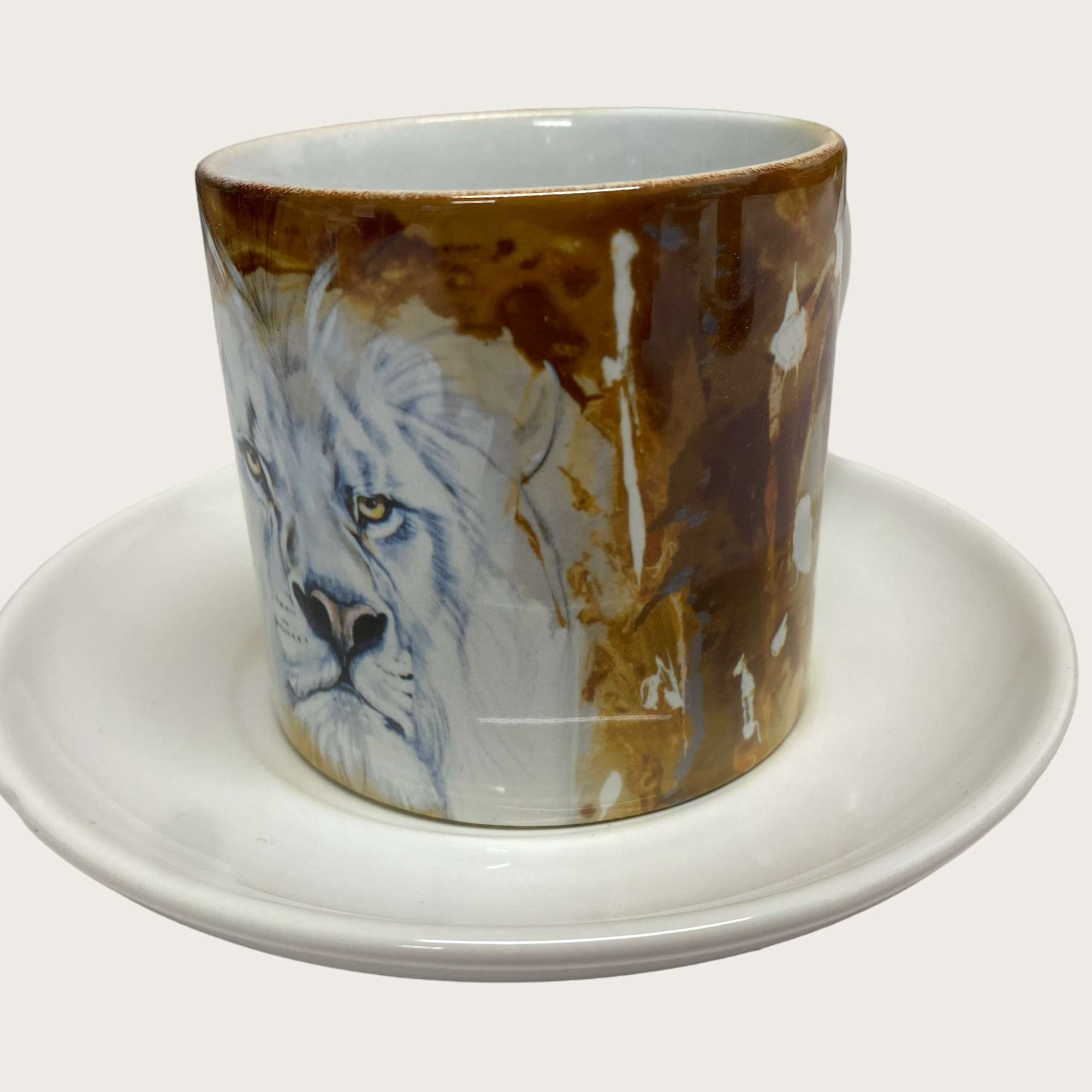 Kaffeetasse mit Unterteller "Löwenkopf“